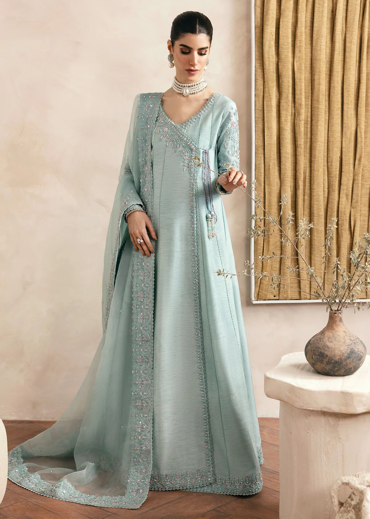 Model wearing Kanwal Malik Daisy pastel blue luxury pret dress. Shop Pakistani clothes online in the UK for festive and casual wear.