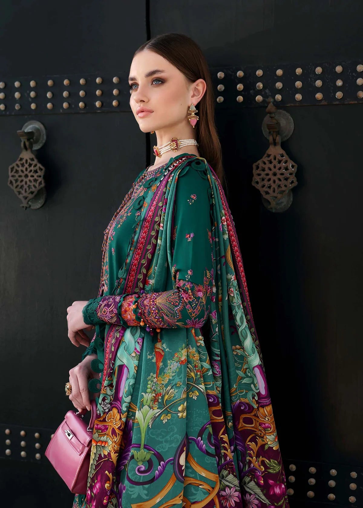 Model wearing deep green Sierra outfit from Kanwal Malik Elysia Luxury Lawn '25, ideal for Pakistani luxury pret and clothes online in UK.
