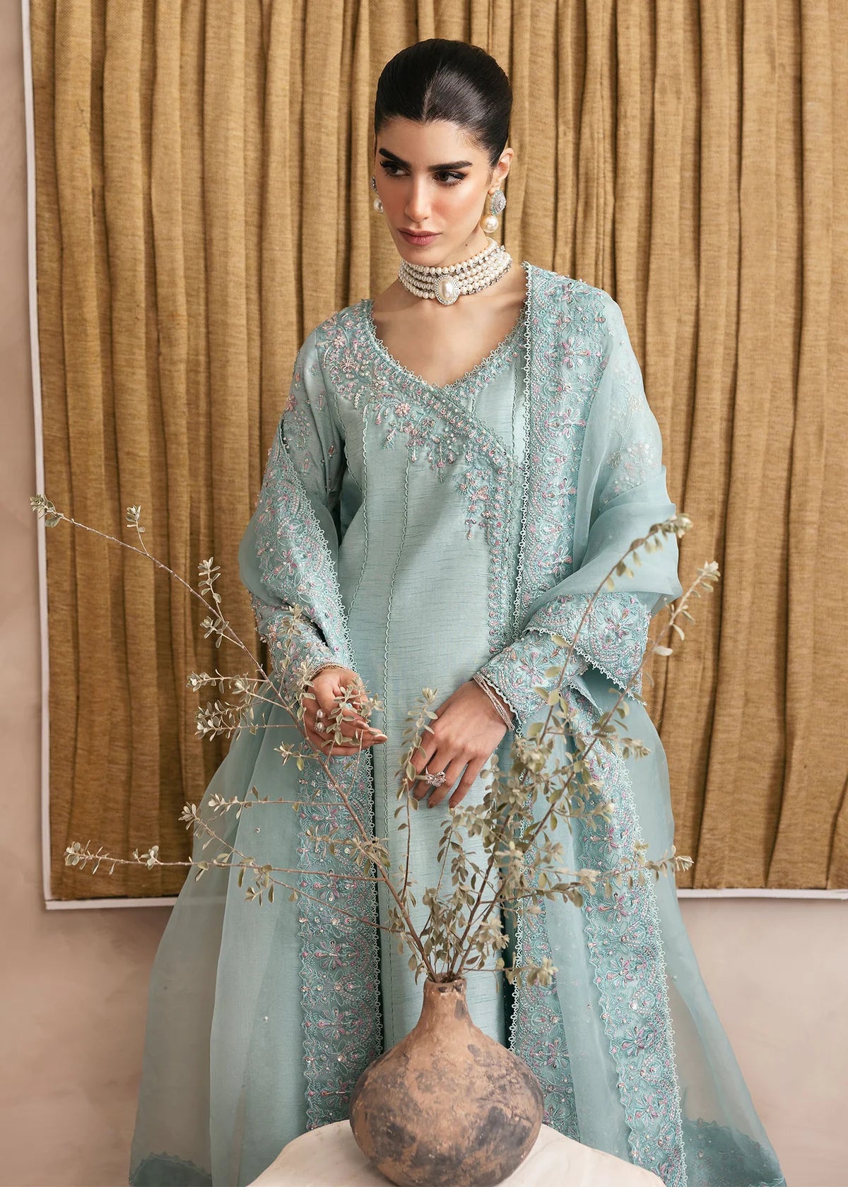 Model wearing Kanwal Malik Daisy pastel blue luxury pret dress. Shop Pakistani clothes online in the UK for festive and casual wear.