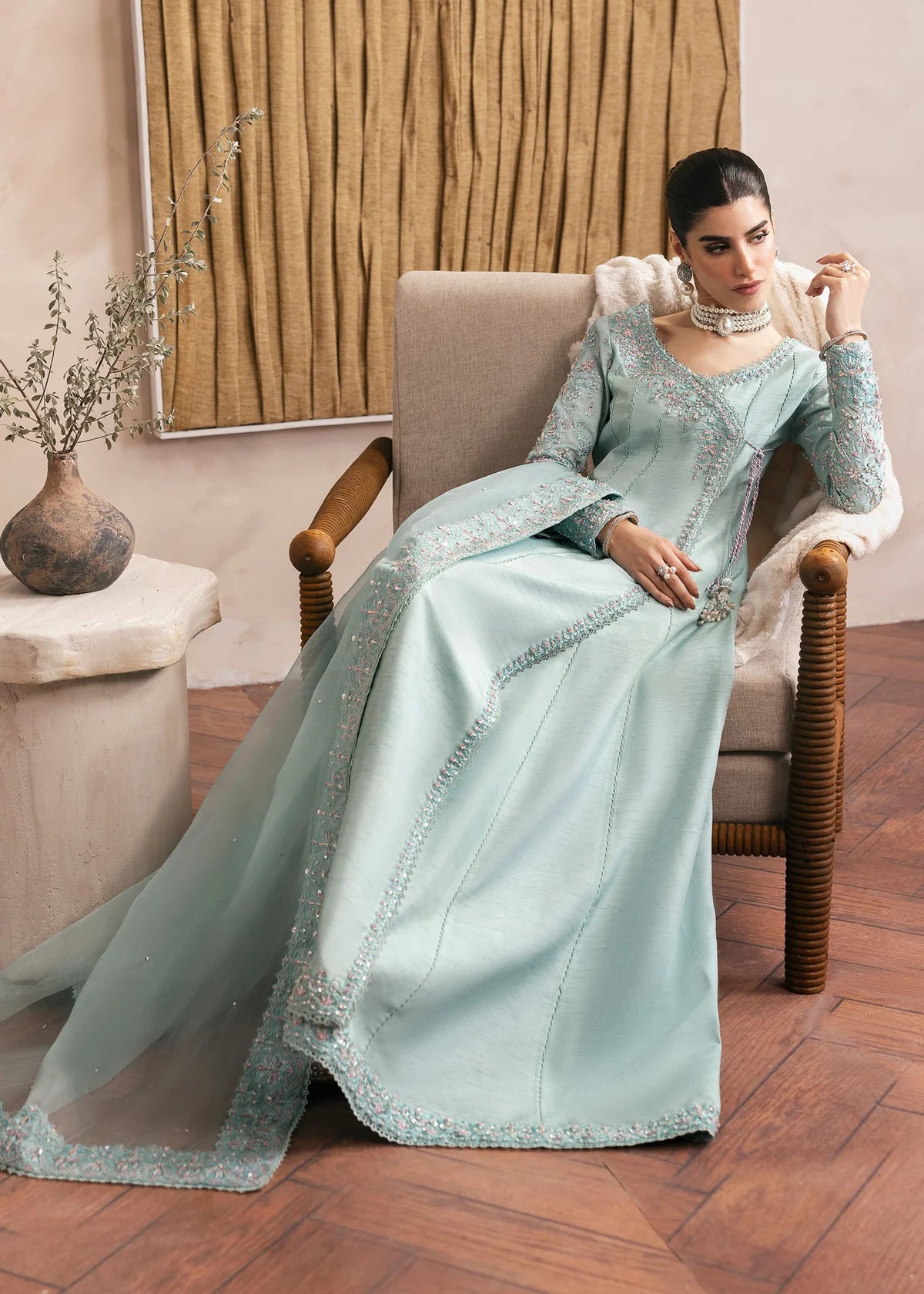 Model wearing Kanwal Malik Daisy pastel blue luxury pret dress. Shop Pakistani clothes online in the UK for festive and casual wear.