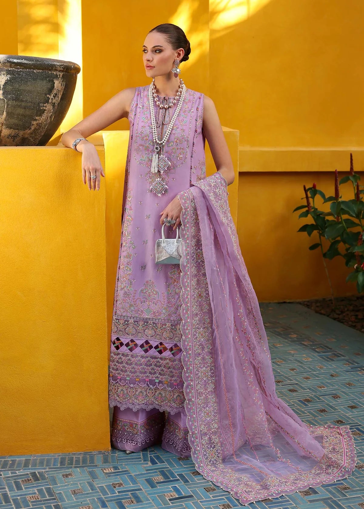 Model wearing pastel lilac Celia outfit from Kanwal Malik Elysia Luxury Lawn '25, ideal for Pakistani luxury pret and clothes online in UK.