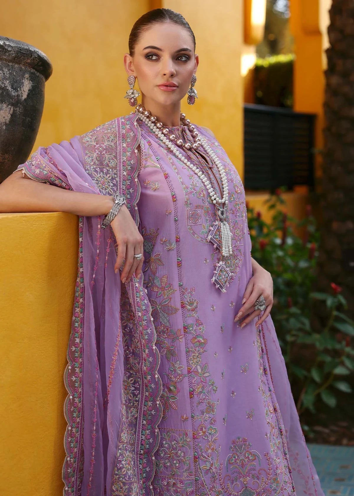Model wearing pastel lilac Celia outfit from Kanwal Malik Elysia Luxury Lawn '25, ideal for Pakistani luxury pret and clothes online in UK.