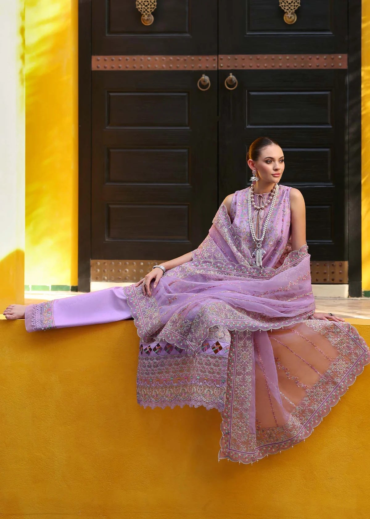 Model wearing pastel lilac Celia outfit from Kanwal Malik Elysia Luxury Lawn '25, ideal for Pakistani luxury pret and clothes online in UK.