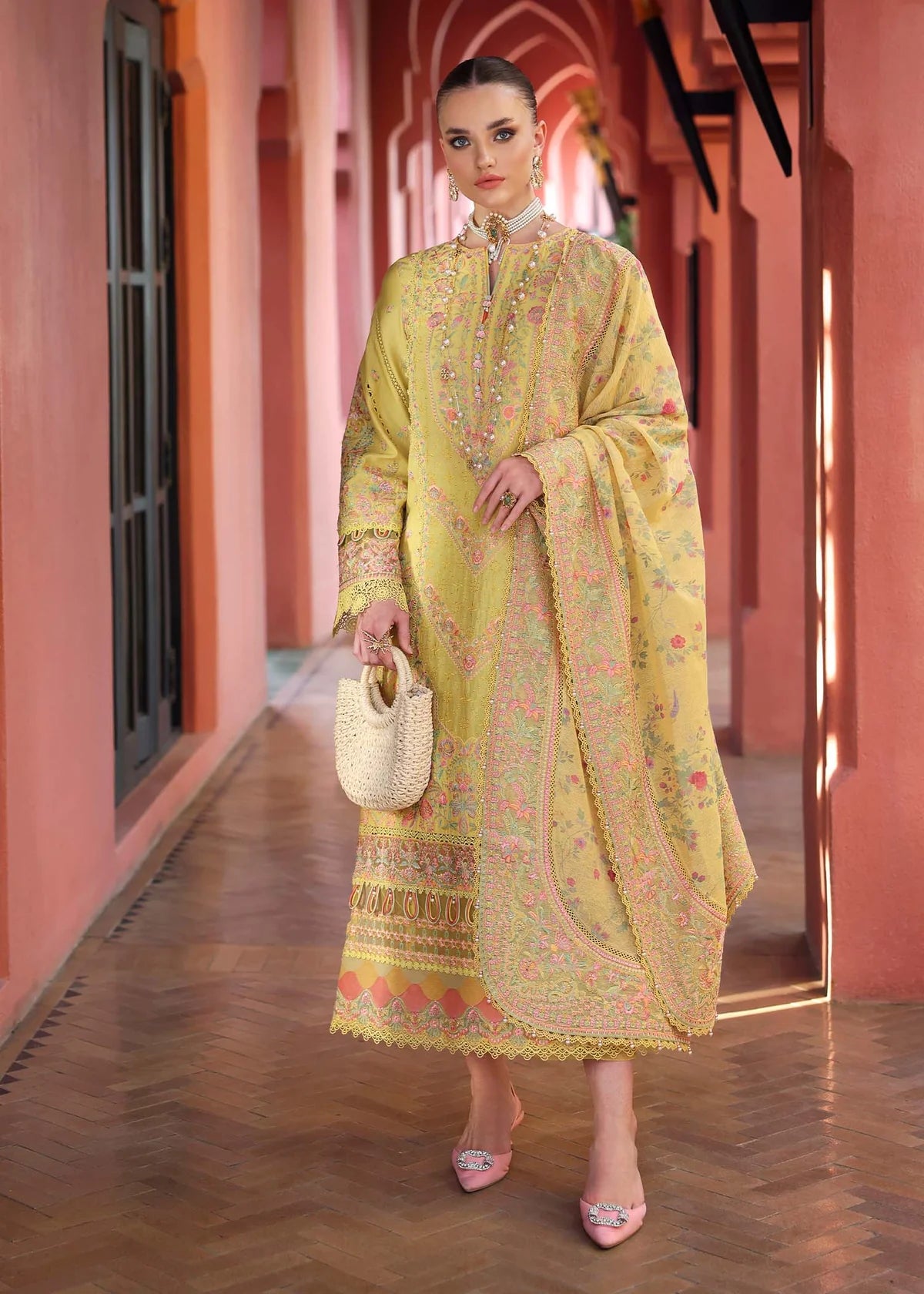 Model wearing yellow Summer outfit from Kanwal Malik Elysia Luxury Lawn '25, ideal for Pakistani luxury pret and clothes online in UK.