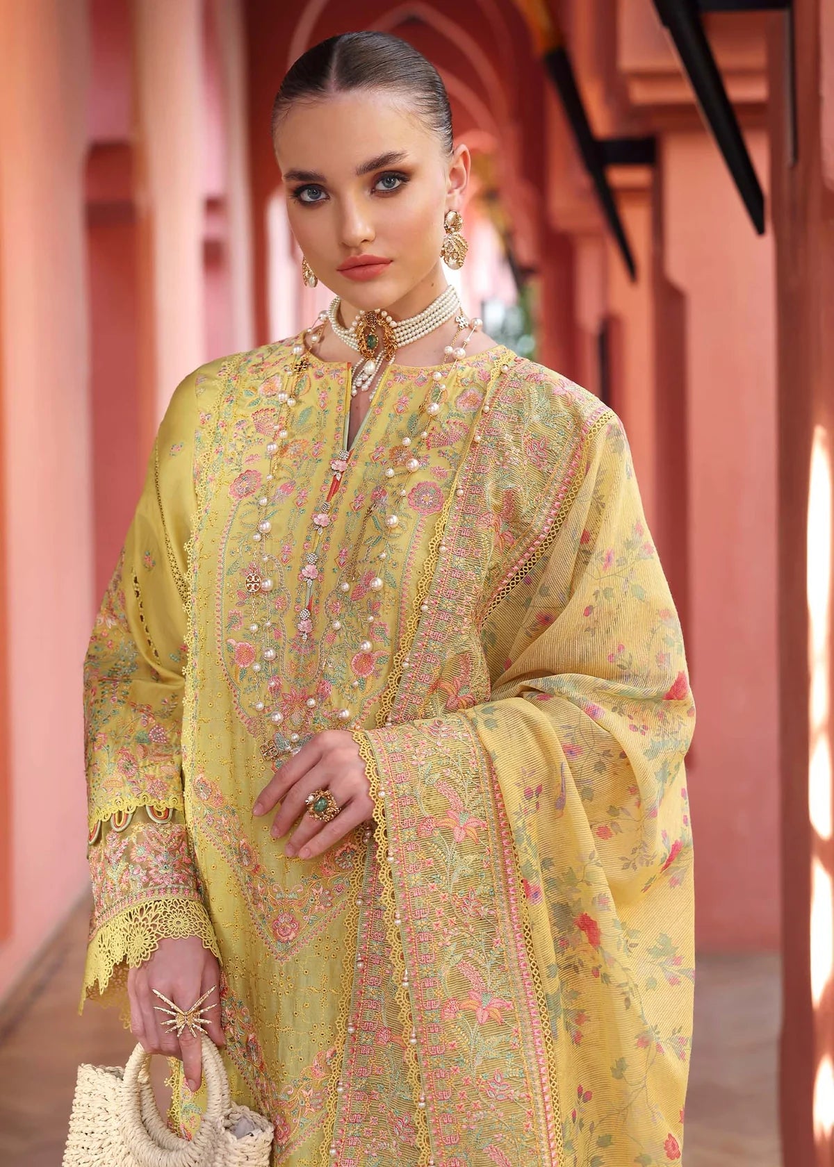 Model wearing yellow Summer outfit from Kanwal Malik Elysia Luxury Lawn '25, ideal for Pakistani luxury pret and clothes online in UK.