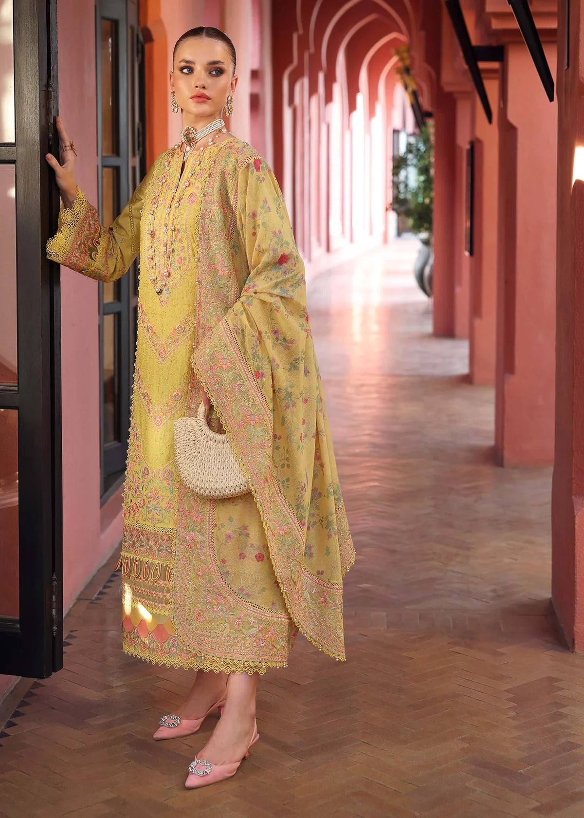 Model wearing yellow Summer outfit from Kanwal Malik Elysia Luxury Lawn '25, ideal for Pakistani luxury pret and clothes online in UK.