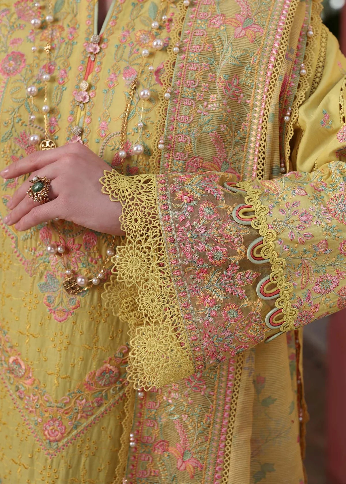 Model wearing yellow Summer outfit from Kanwal Malik Elysia Luxury Lawn '25, ideal for Pakistani luxury pret and clothes online in UK.
