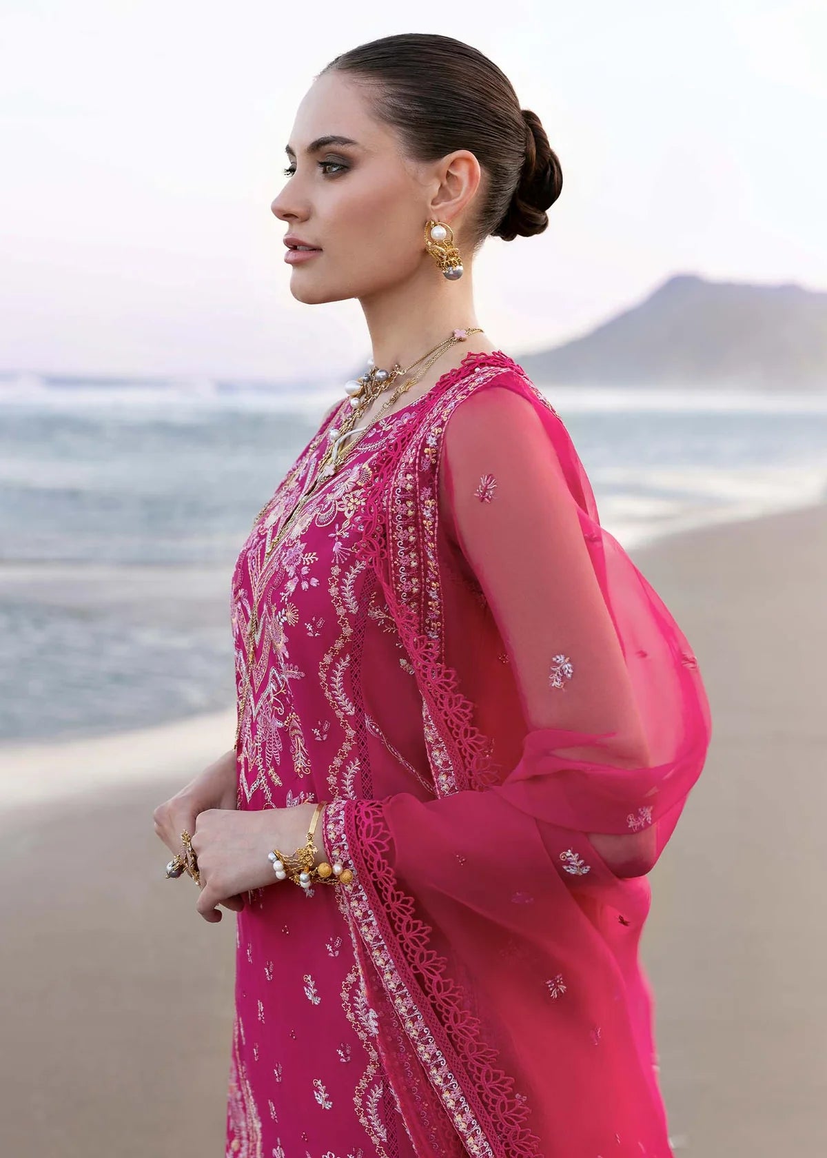 Model wearing Fuchsia Evaline dress from Kanwal Malik Elysia Luxury Lawn '25, perfect for Pakistani luxury pret and clothes online in UK.