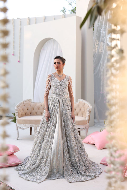 Model wearing silver embellished gown Isabella from Mysie By Tahira Wedding Edits '25, Pakistani luxury pret and clothes online in UK.