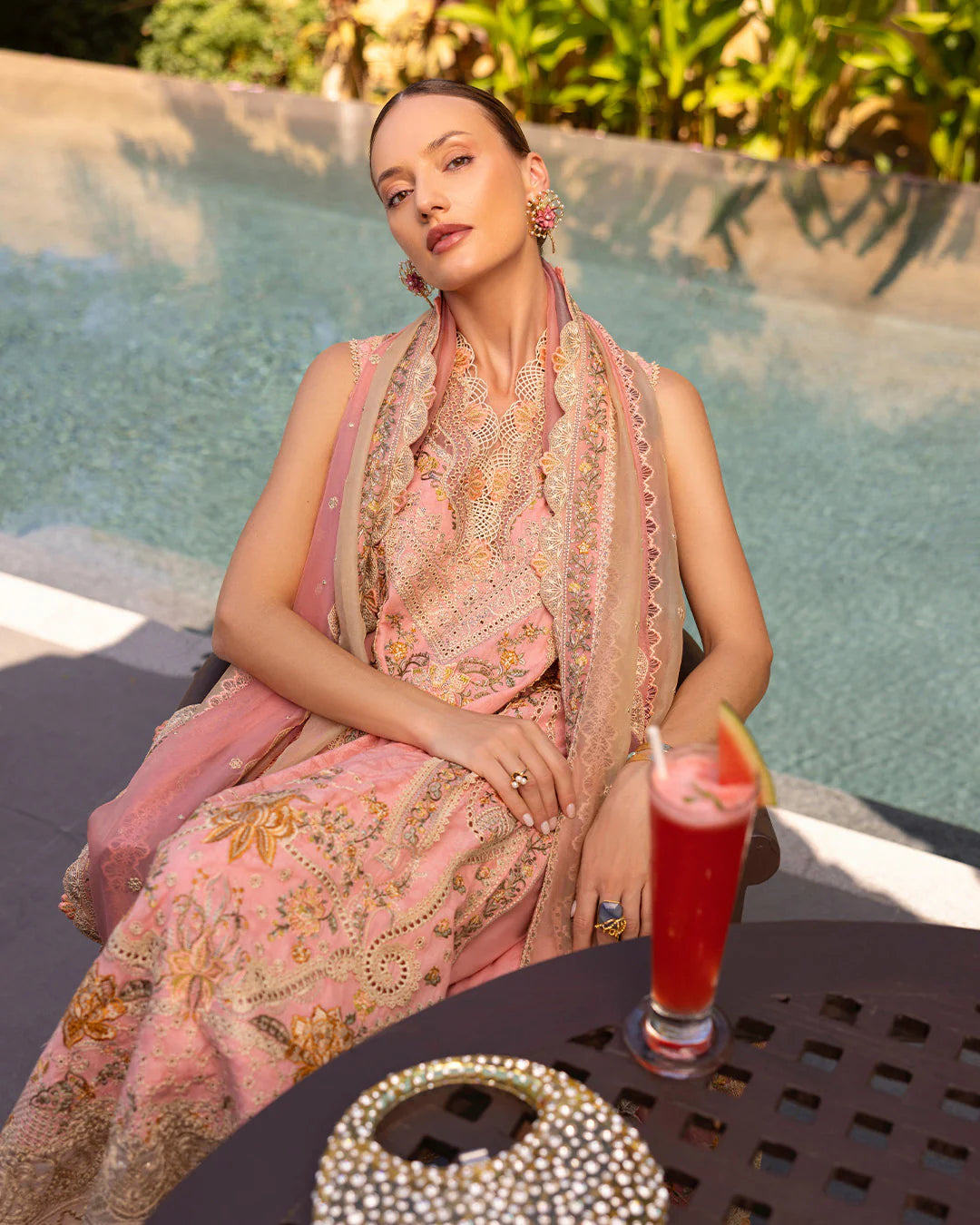 Model wearing peach and gold Peony dress from Faiza Saqlain Zinnia collection, Pakistani Luxury pret, Pakistani clothes online in UK.
