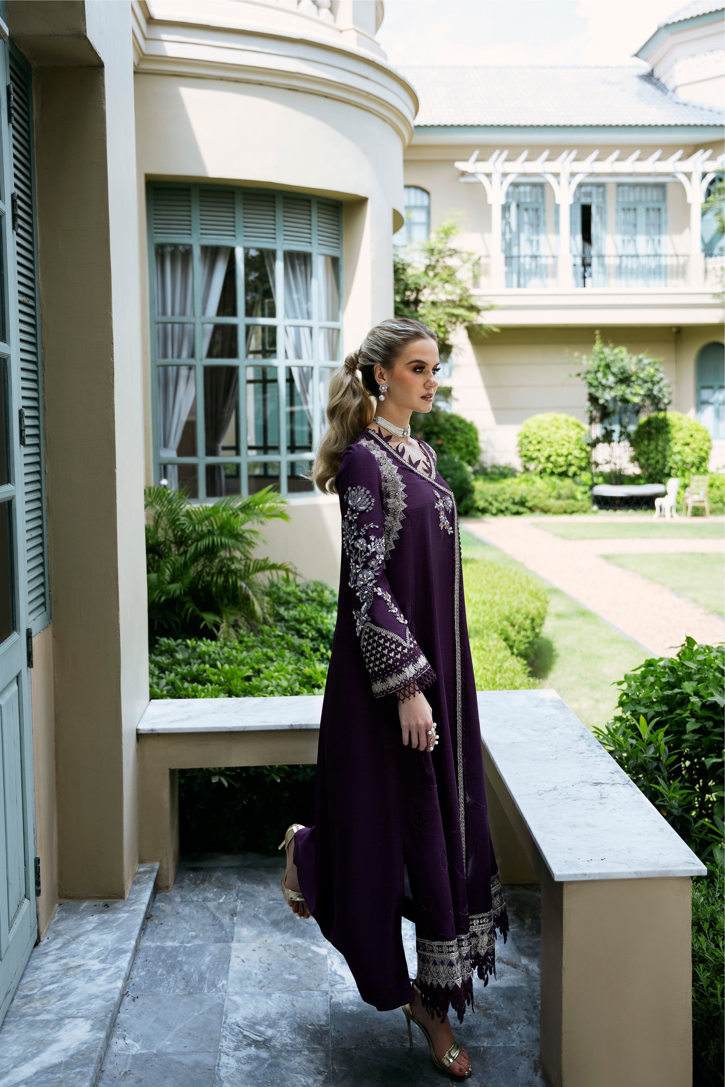 Model wearing Jamini from Mysie by Tahira, a purple embellished dress with a modern silhouette, perfect for Pakistani luxury pret in the UK.