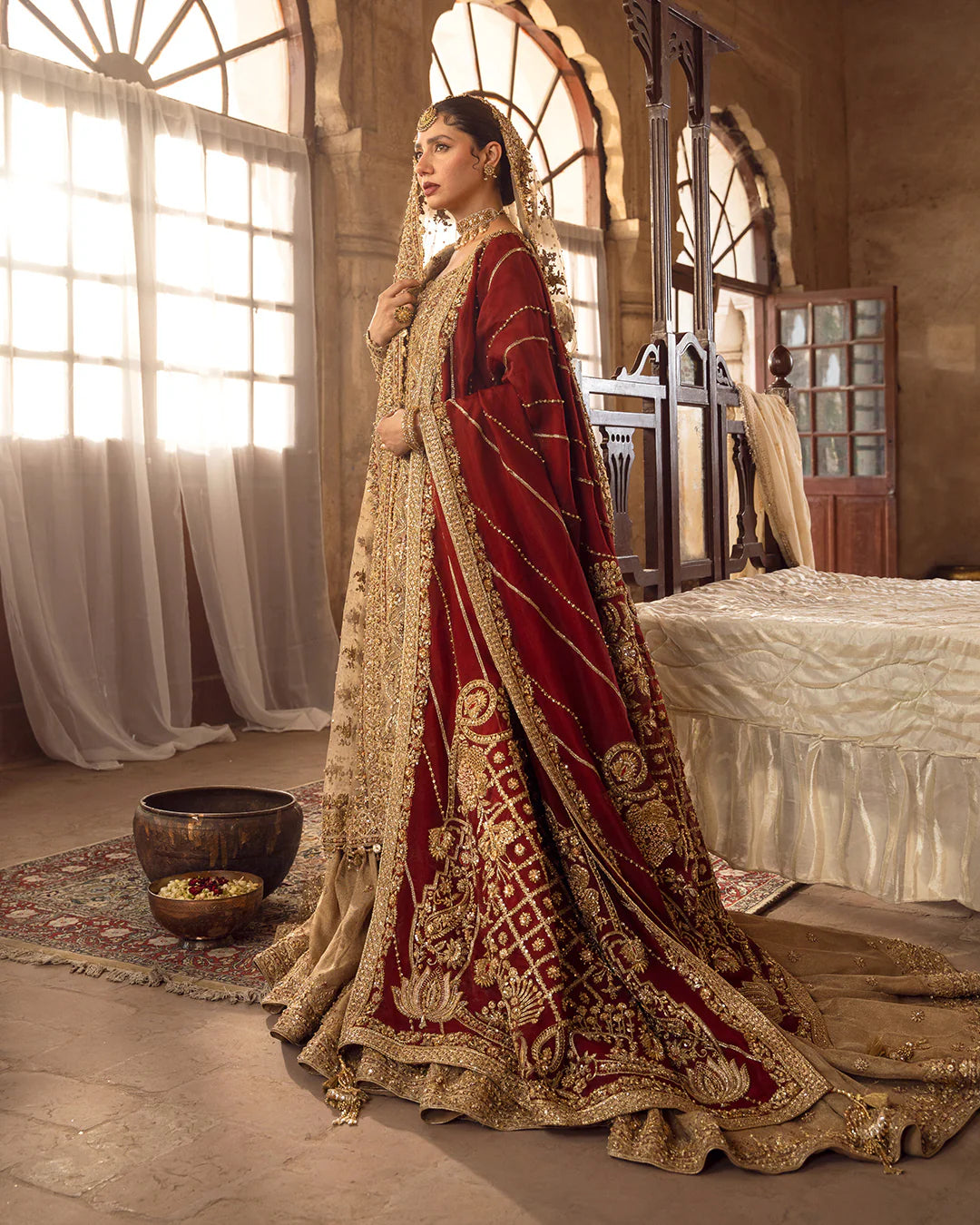 Model wearing golden brown bridal dress Naisha by Faiza Saqlain, Pakistani luxury pret online in UK for weddings.