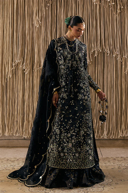 Model wearing black embellished ensemble from Suffuse Kiaray, Pakistani luxury pret, shop Pakistani clothes online in UK
