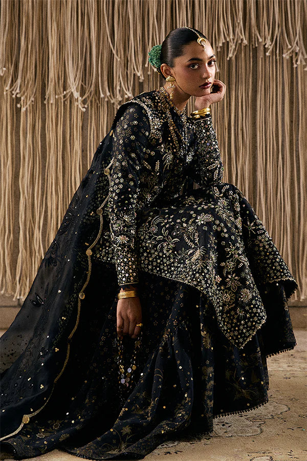 Model wearing black embellished ensemble from Suffuse Kiaray, Pakistani luxury pret, shop Pakistani clothes online in UK
