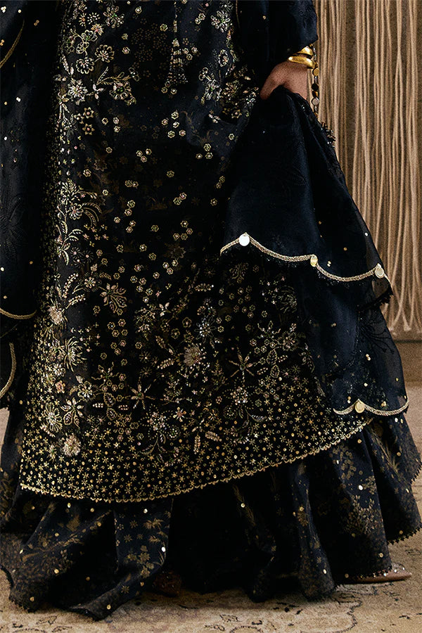 Model wearing black embellished ensemble from Suffuse Kiaray, Pakistani luxury pret, shop Pakistani clothes online in UK
