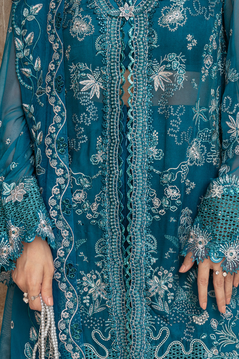Model wearing soft lilac embroidered chiffon dress WC-04 NESSA from Qalamkar, ideal Pakistani luxury pret for Pakistani clothes online in UK.
