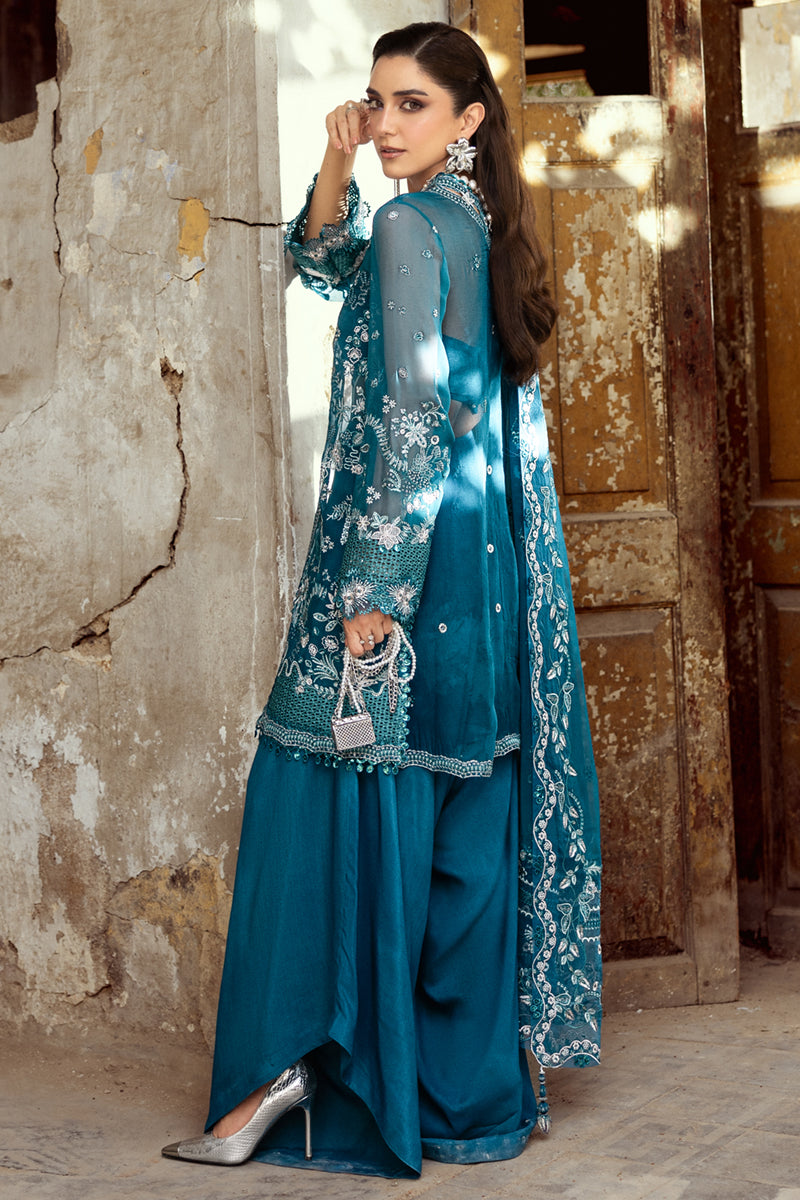 Model wearing soft lilac embroidered chiffon dress WC-04 NESSA from Qalamkar, ideal Pakistani luxury pret for Pakistani clothes online in UK.
