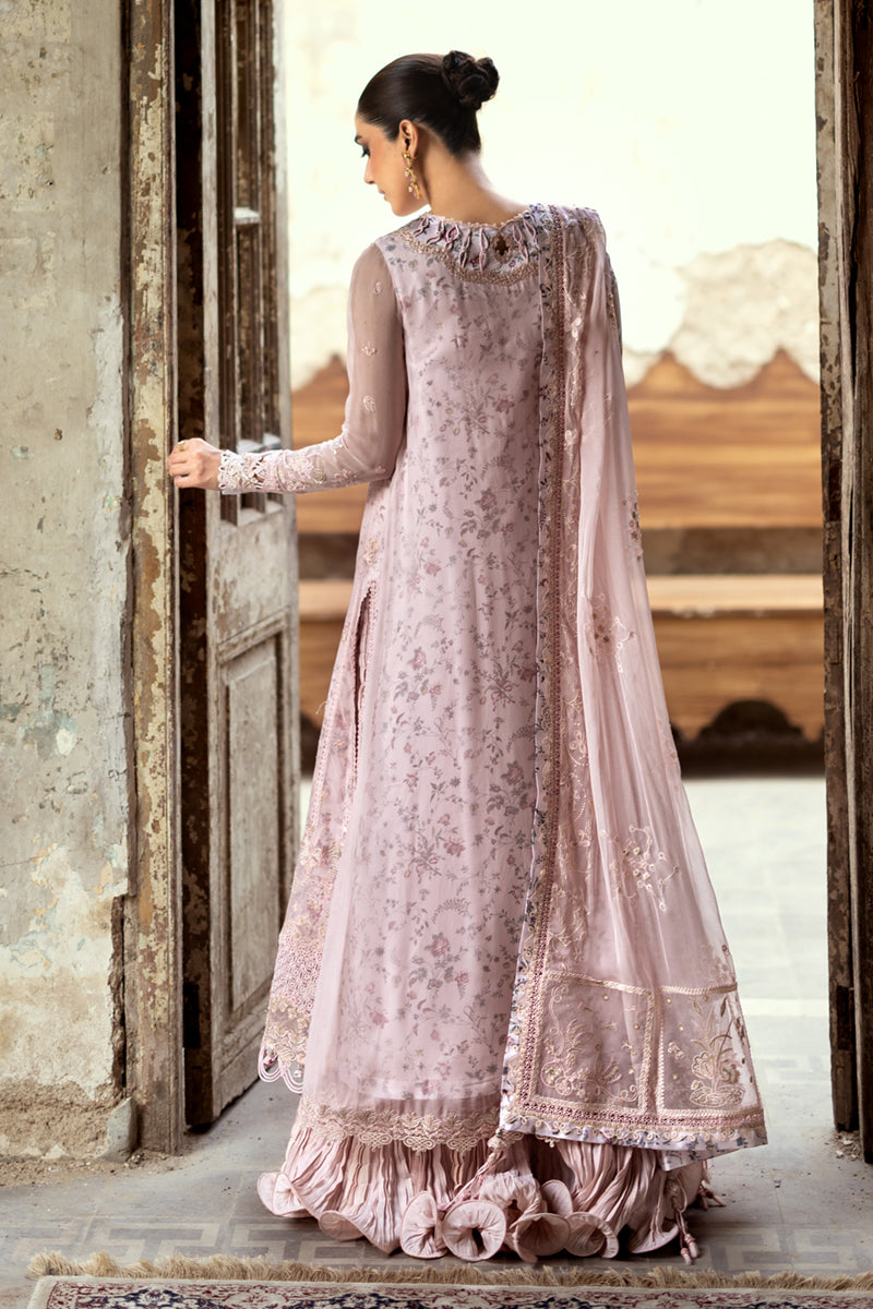 Model wearing sea green embroidered chiffon outfit WC-05 RIONA from Qalamkar, Pakistani Luxury pret for Pakistani clothes online in UK.
