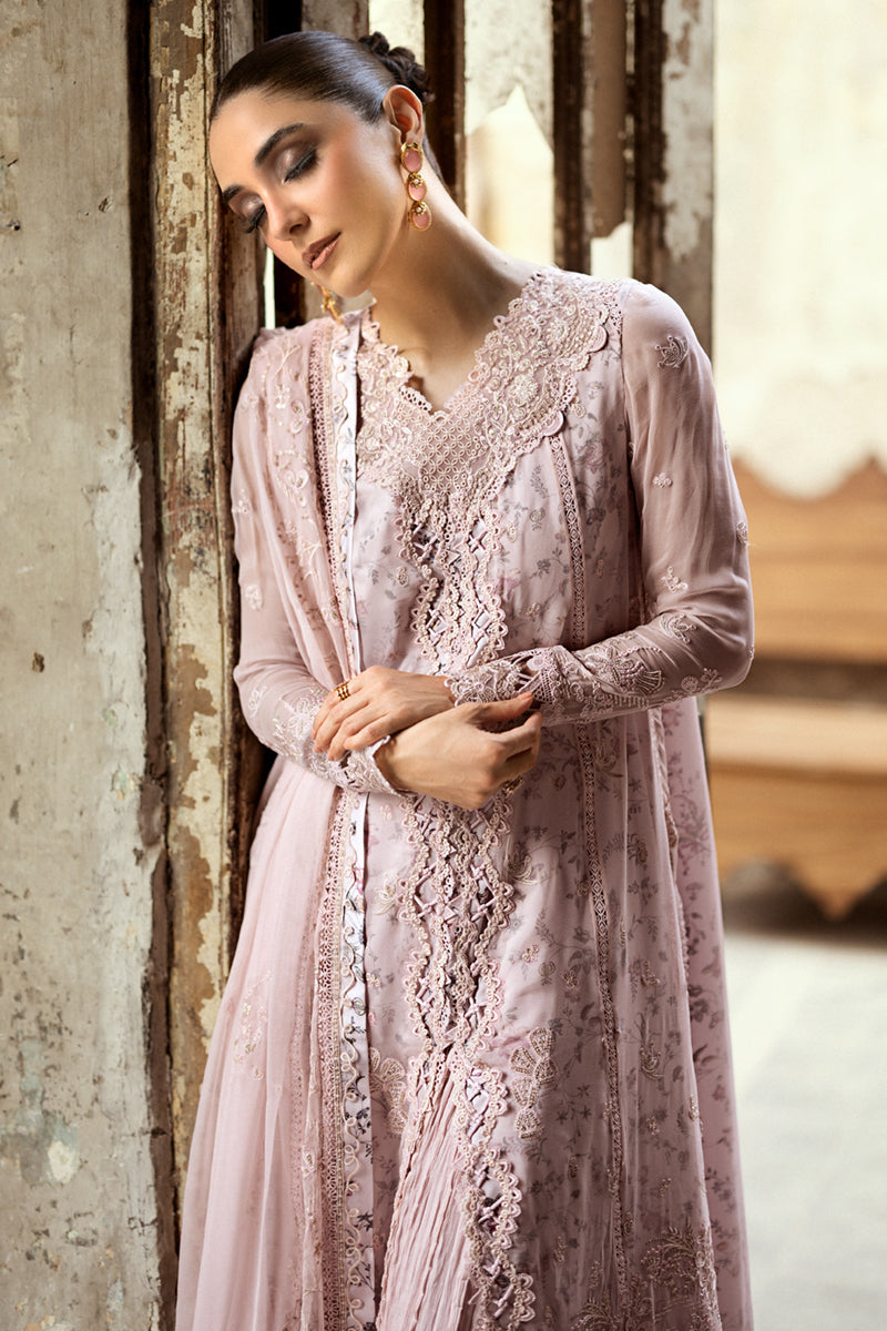 Model wearing sea green embroidered chiffon outfit WC-05 RIONA from Qalamkar, Pakistani Luxury pret for Pakistani clothes online in UK.

