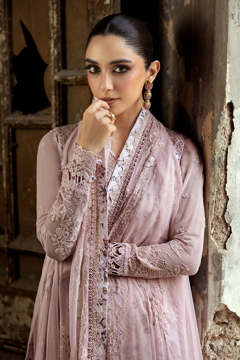 Model wearing sea green embroidered chiffon outfit WC-05 RIONA from Qalamkar, Pakistani Luxury pret for Pakistani clothes online in UK.
