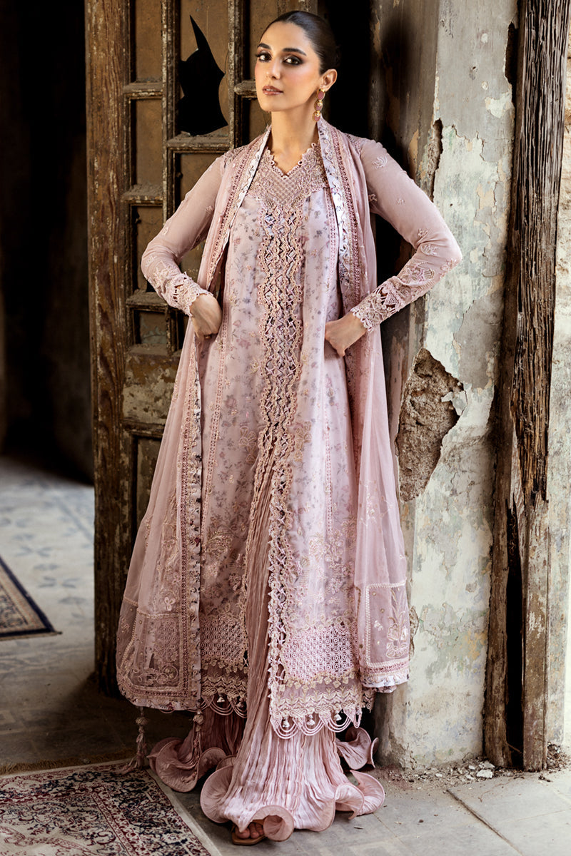 Model wearing sea green embroidered chiffon outfit WC-05 RIONA from Qalamkar, Pakistani Luxury pret for Pakistani clothes online in UK.
