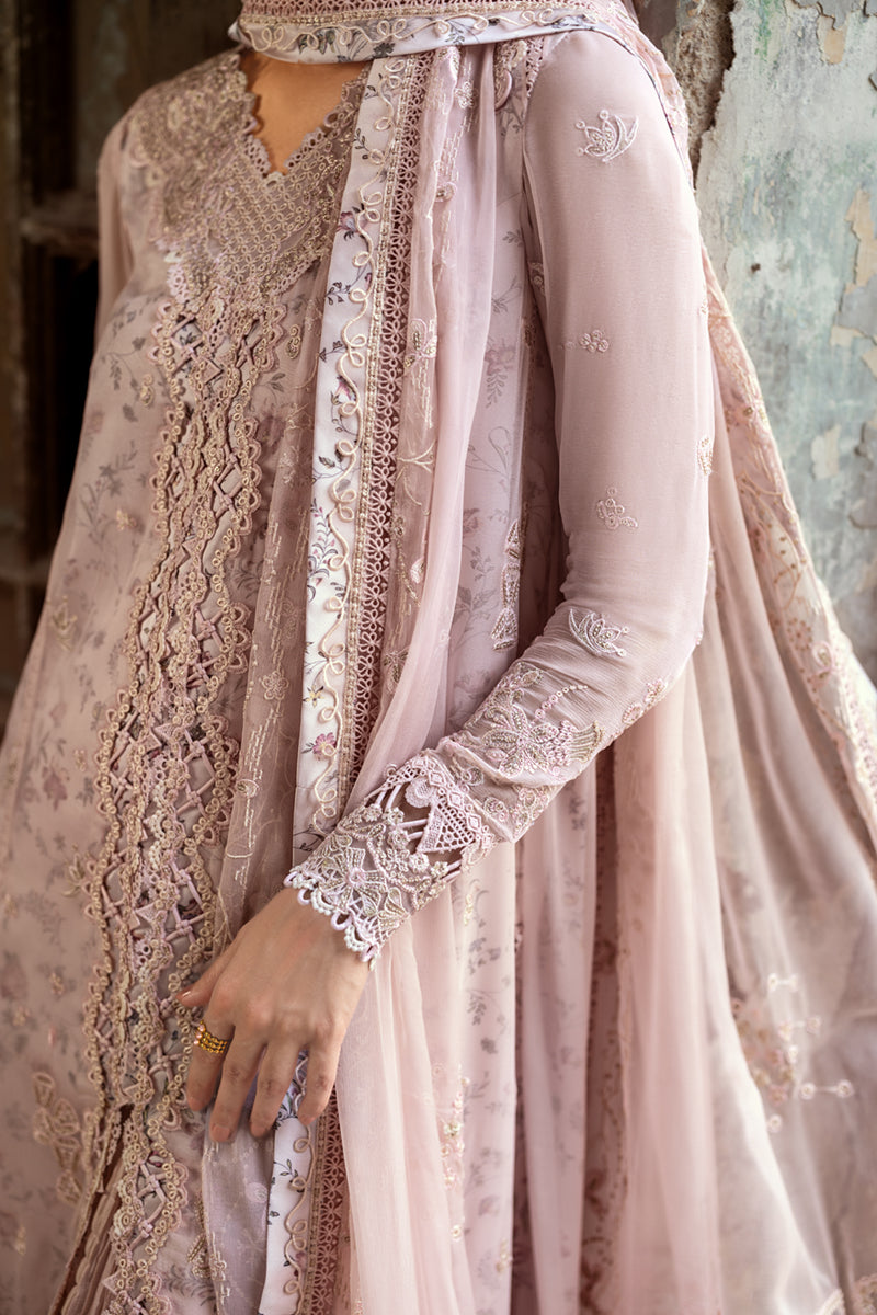 Model wearing sea green embroidered chiffon outfit WC-05 RIONA from Qalamkar, Pakistani Luxury pret for Pakistani clothes online in UK.
