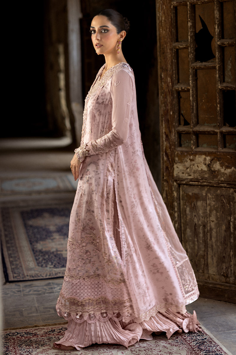 Model wearing sea green embroidered chiffon outfit WC-05 RIONA from Qalamkar, Pakistani Luxury pret for Pakistani clothes online in UK.
