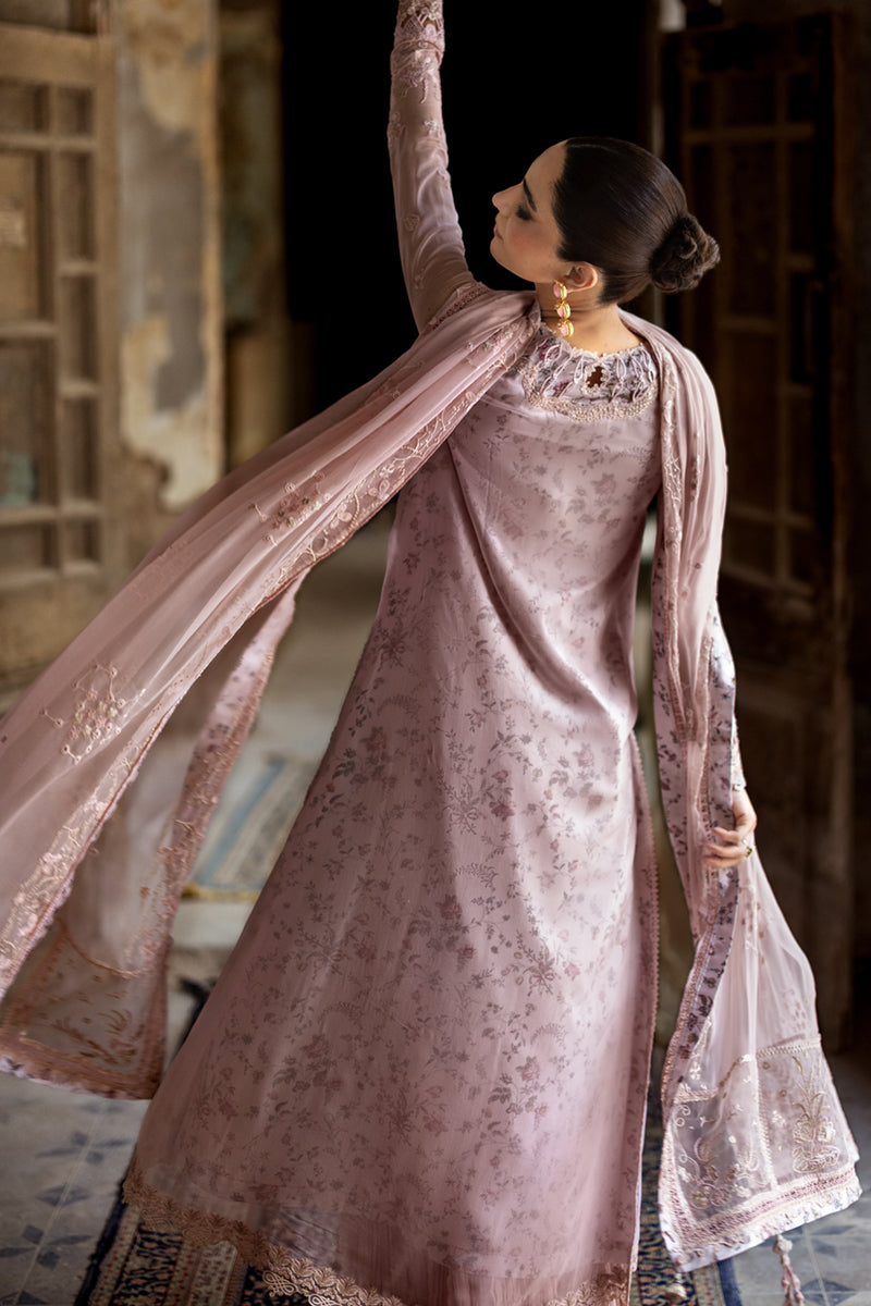 Model wearing sea green embroidered chiffon outfit WC-05 RIONA from Qalamkar, Pakistani Luxury pret for Pakistani clothes online in UK.
