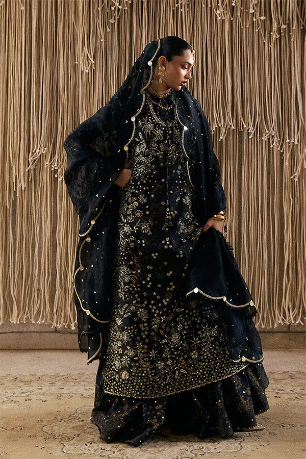 Model wearing black embellished ensemble from Suffuse Kiaray, Pakistani luxury pret, shop Pakistani clothes online in UK
