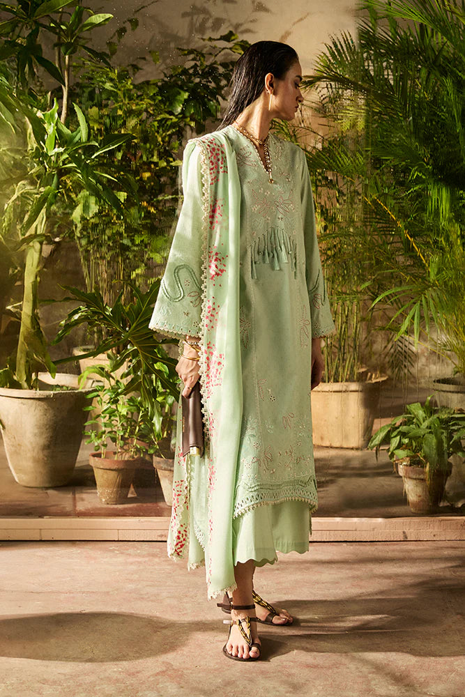 Model wearing Nore by Suffuse in mint green with subtle embroidery and pink accents – a graceful Pakistani luxury pret outfit in UK.
