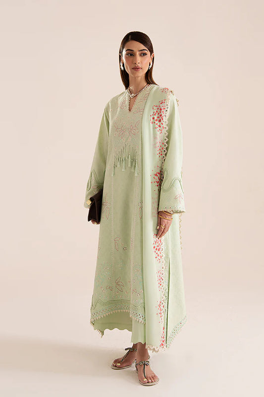 Model wearing Nore by Suffuse in mint green with subtle embroidery and pink accents – a graceful Pakistani luxury pret outfit in UK.