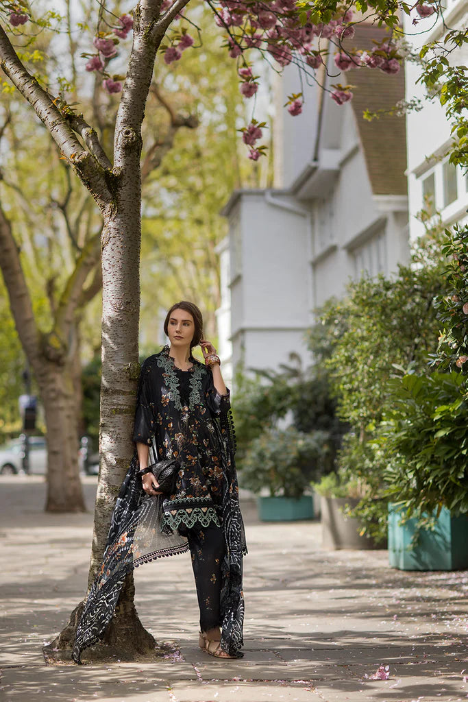 Model wearing black printed Sobia Nazir Design 3B from SN Basics '25, Pakistani luxury pret, perfect for Eid, available online in UK.