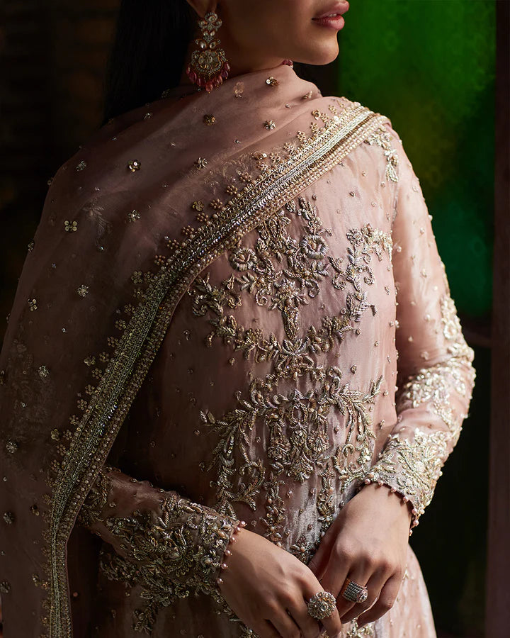 model wearing dusty pink embroidered dress by Faiza Saqlain, Pakistani luxury pret available online in UK