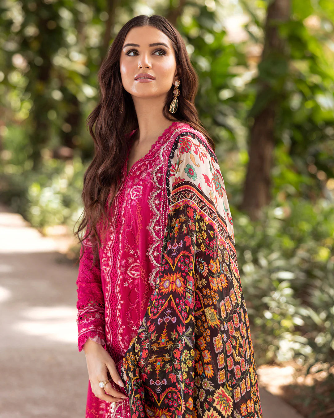 Model wearing vibrant pink Varda dress from Faiza Saqlain Zinnia, Pakistani Luxury pret, Pakistani clothes online in UK.