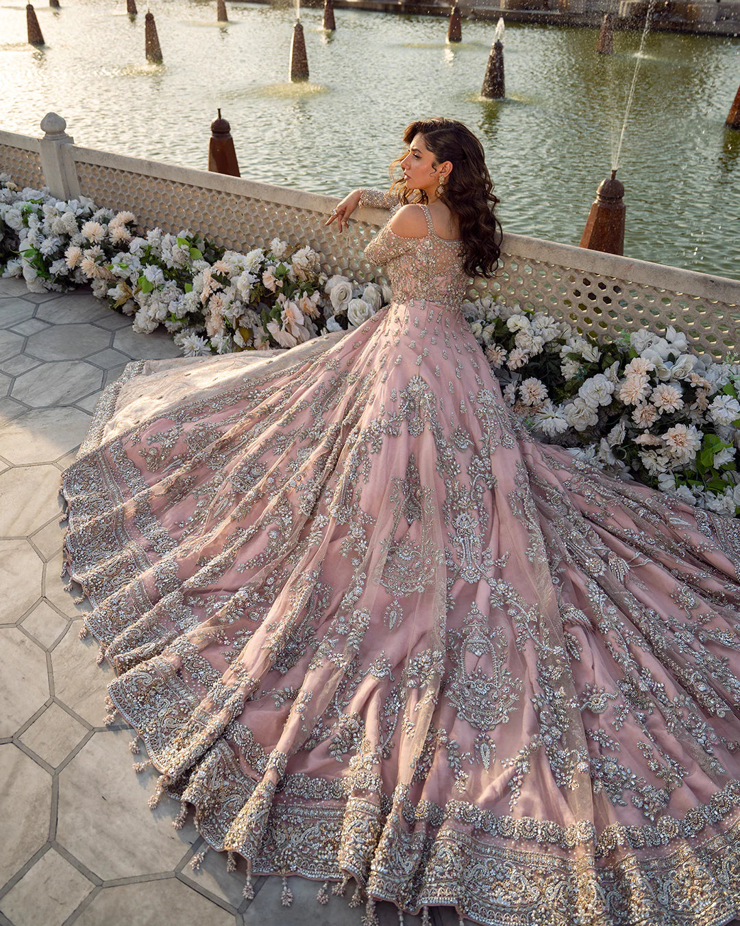 Model wearing dusty pink Aysana dress by Faiza Saqlain, Pakistani luxury pret online in UK for weddings and festive wear.