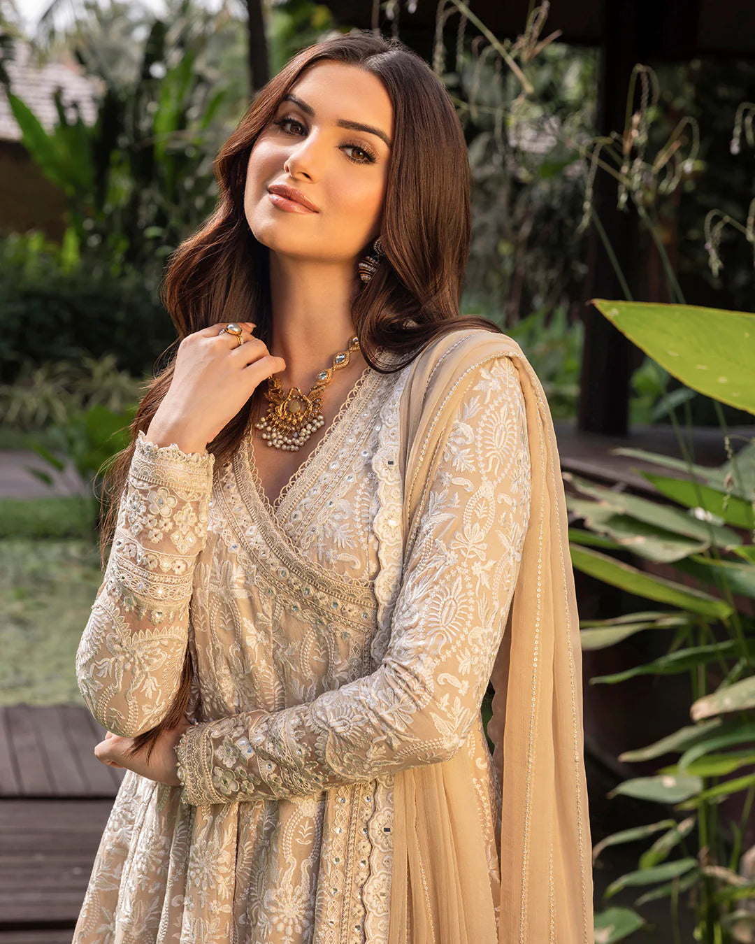 Model wearing ivory Ilima dress from Faiza Saqlain Zinnia collection, Pakistani Luxury pret, Pakistani clothes online in UK.