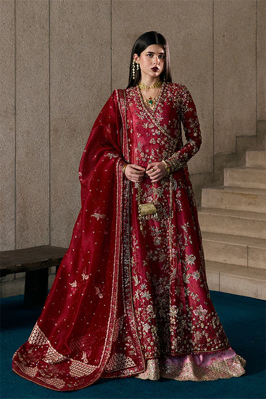 Model wearing wine red embellished ensemble from Suffuse Jaseria, Pakistani luxury pret, shop Pakistani clothes online in UK
