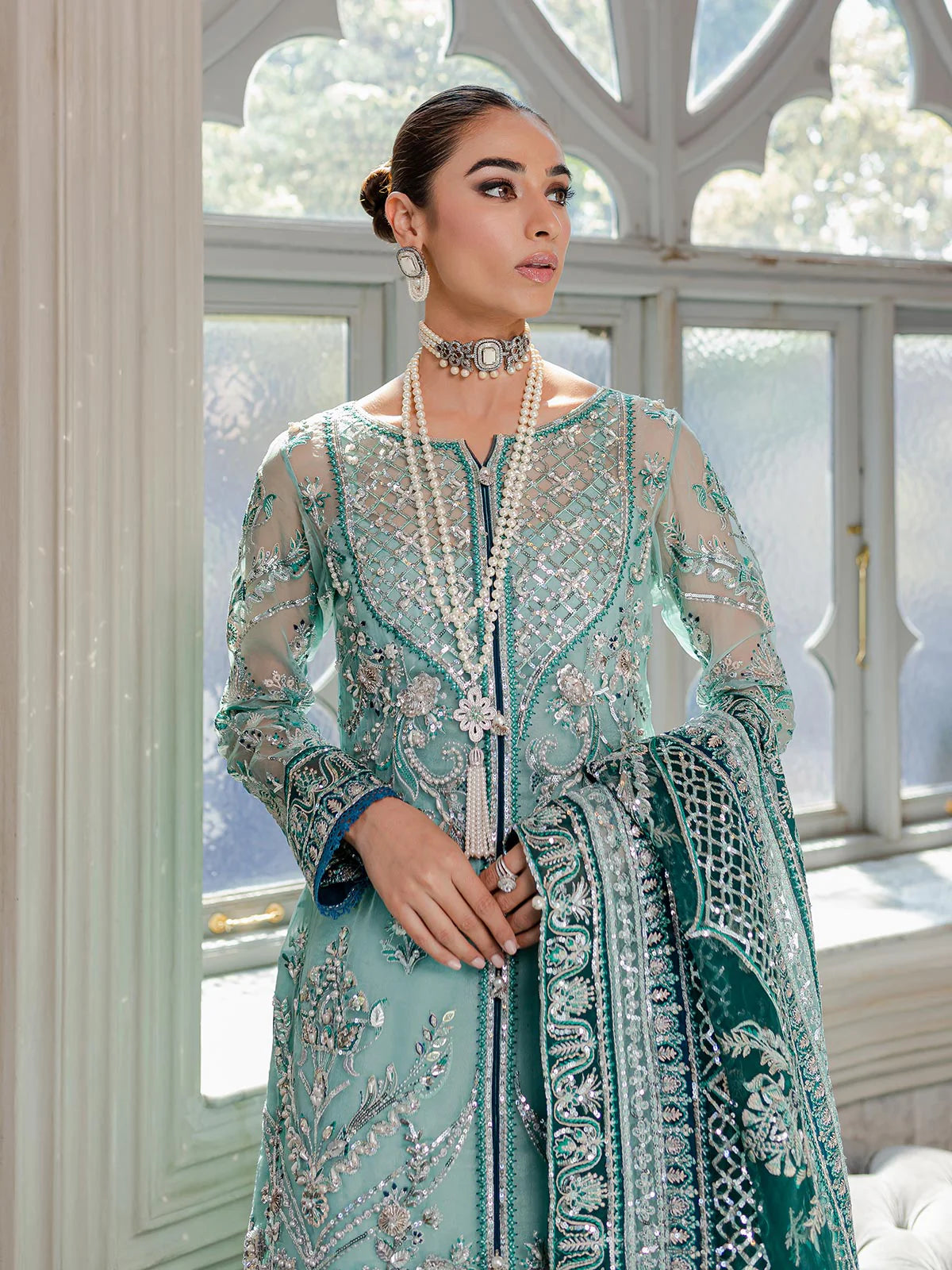 Model wearing sea green Milica outfit from Gulaal—Pakistani luxury pret with intricate embroidery, shop Pakistani clothes online in UK.