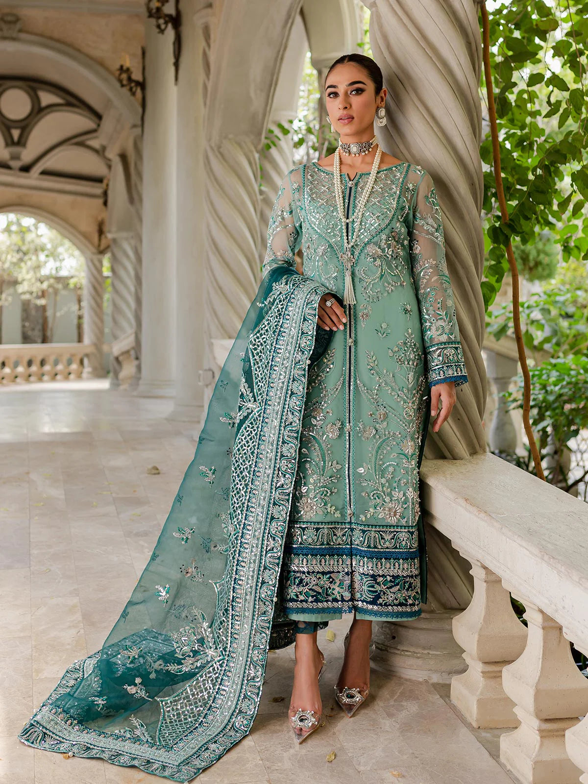 Model wearing sea green Milica outfit from Gulaal—Pakistani luxury pret with intricate embroidery, shop Pakistani clothes online in UK.