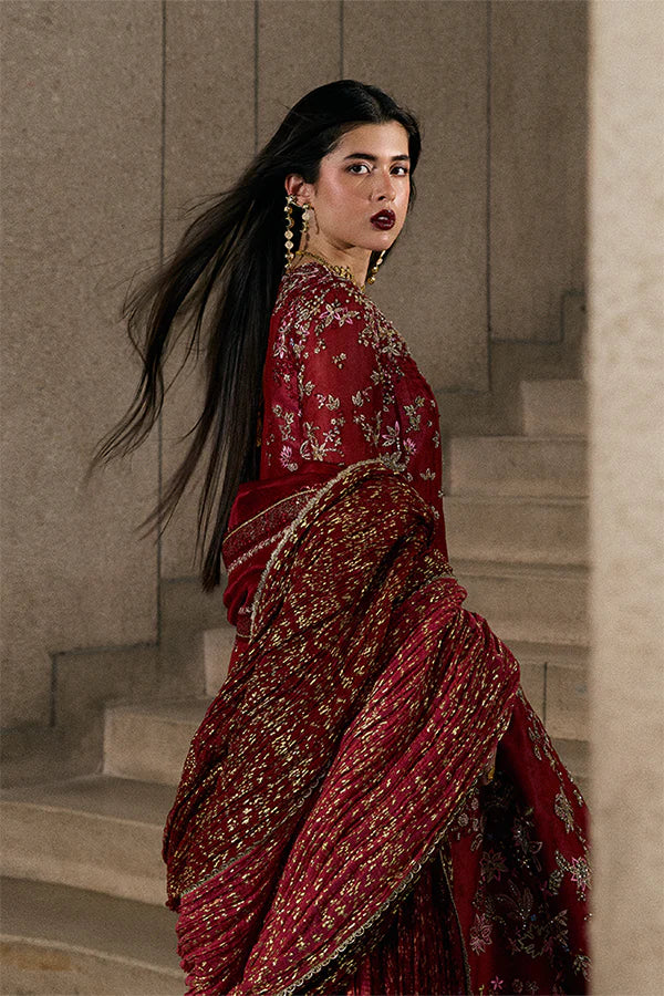 Model wearing wine red embellished ensemble from Suffuse Jaseria, Pakistani luxury pret, shop Pakistani clothes online in UK
