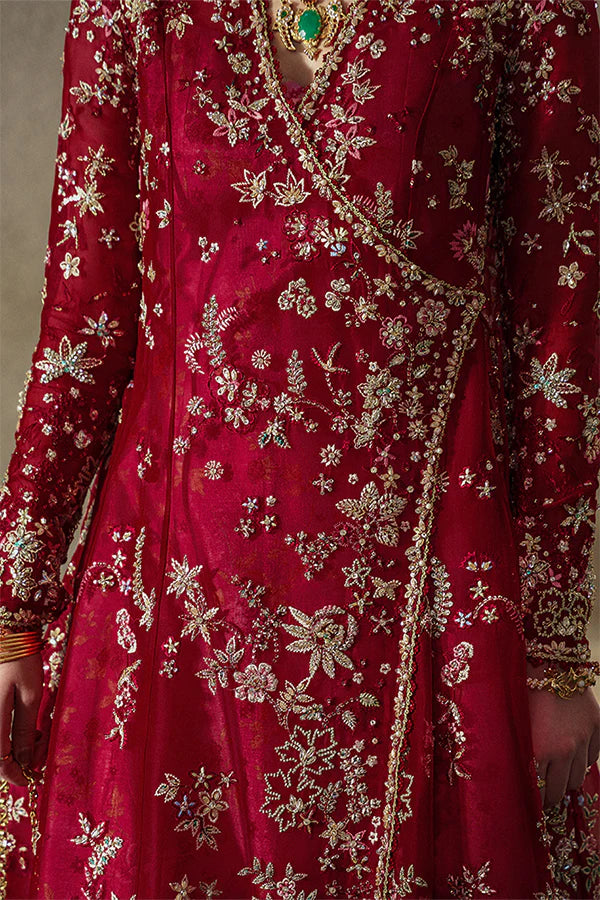 Model wearing wine red embellished ensemble from Suffuse Jaseria, Pakistani luxury pret, shop Pakistani clothes online in UK
