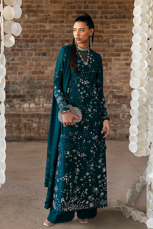 Model wearing SOLARA, front view, a Pakistani designer outfit by Suffuse, available online in the UK.