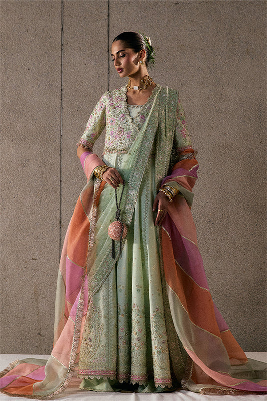Model wearing pastel green embellished ensemble from Suffuse Aymara, Pakistani luxury pret, shop Pakistani clothes online in UK

