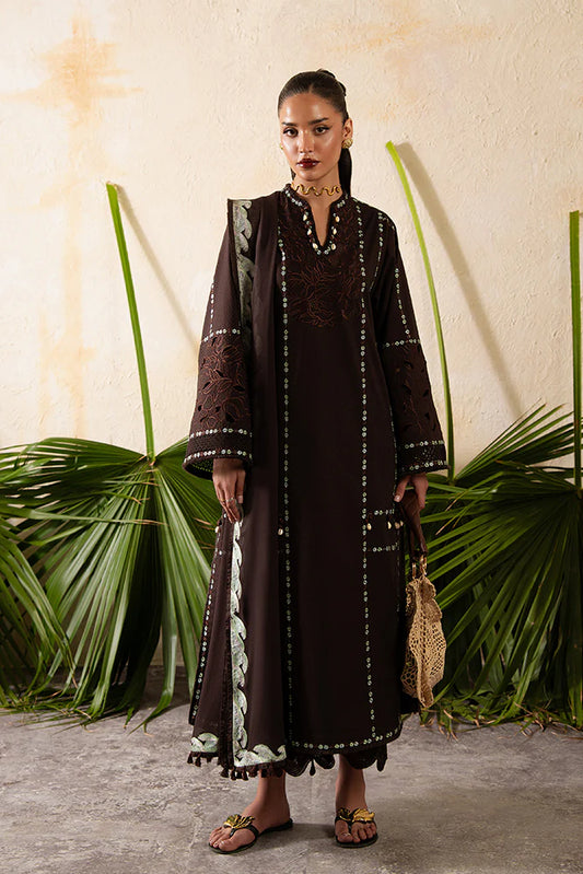 Model wearing Ruva by Suffuse in deep chocolate brown with embroidered details – chic Pakistani luxury pret outfit in UK.