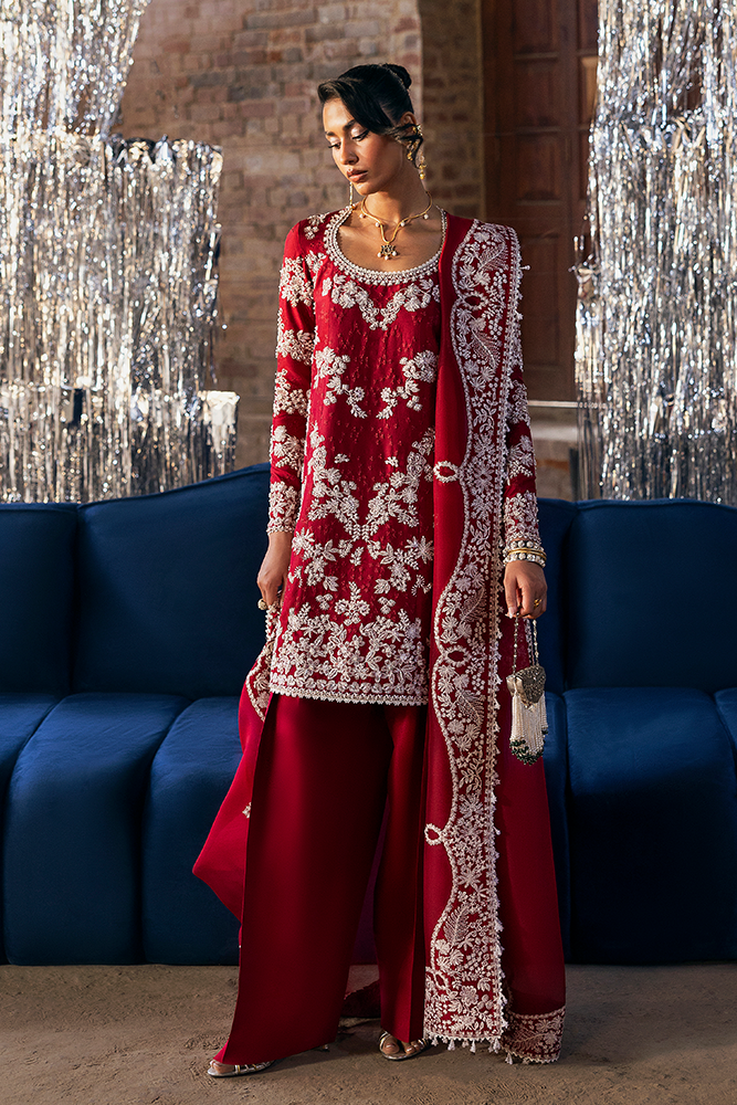 Model wearing SERI, front view, a Pakistani designer outfit by Suffuse, available online in the UK.