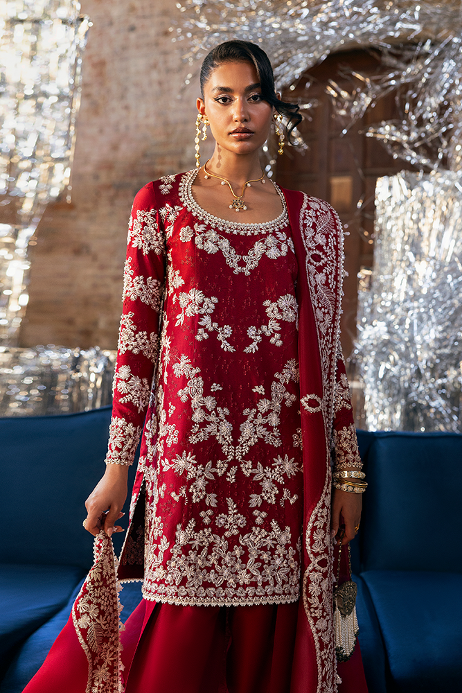 Model wearing SERI, back view, a Pakistani designer outfit by Suffuse, available online in the UK.