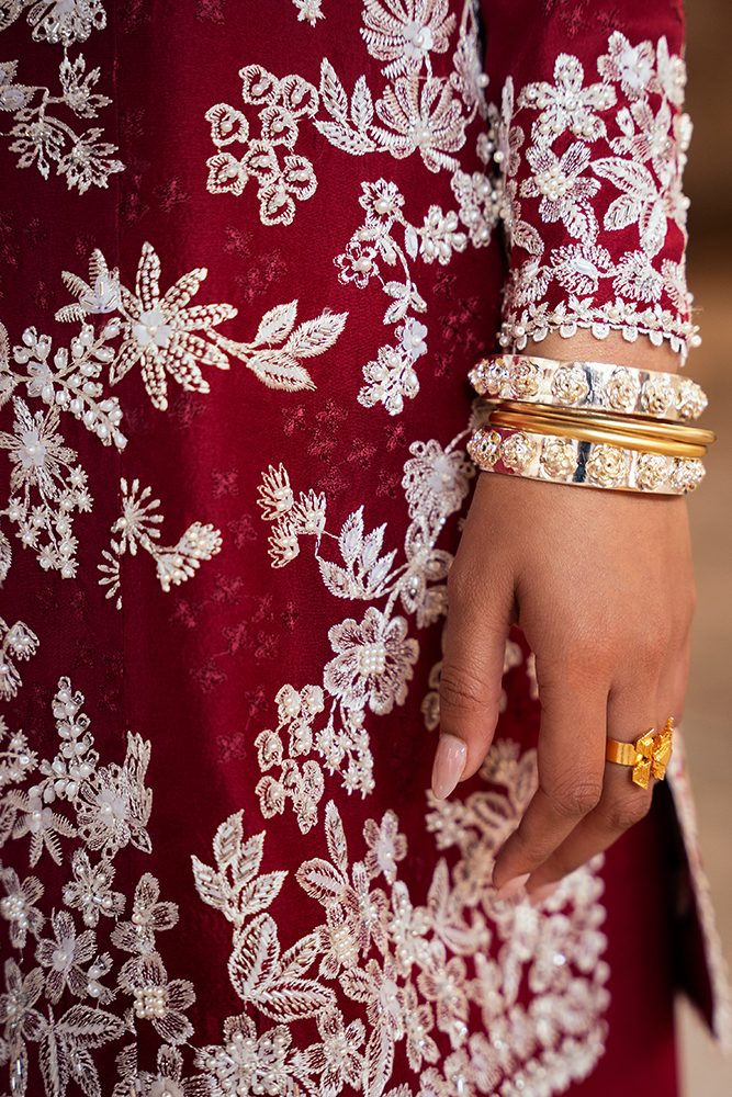 Model wearing SERI, side angle, a Pakistani designer outfit by Suffuse, available online in the UK.