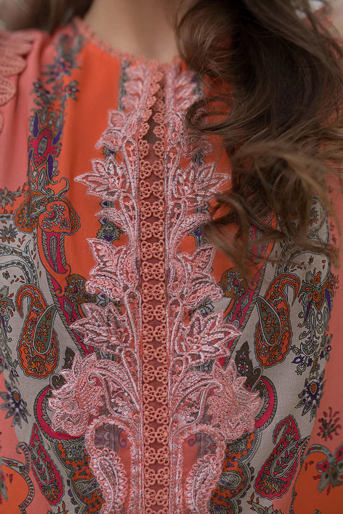 Model wearing peach-orange printed Sobia Nazir Design 4A from SN Basics '25, Pakistani luxury pret, available online in UK for Eid wear.