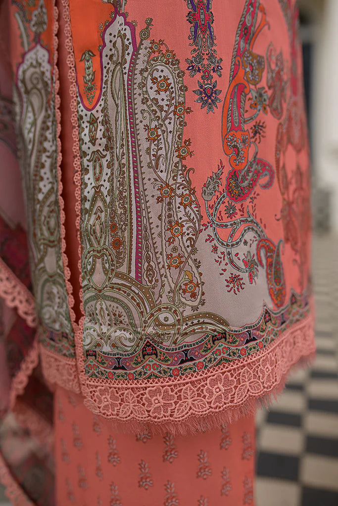 Model wearing peach-orange printed Sobia Nazir Design 4A from SN Basics '25, Pakistani luxury pret, available online in UK for Eid wear.