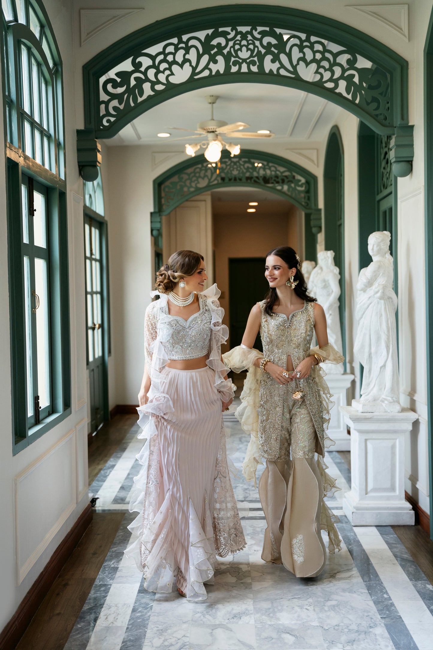 Model wearing Fifi from Mysie by Tahira, a beige embellished outfit with flared pants, perfect for Pakistani luxury pret in the UK.